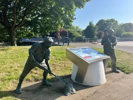 An image of two digger worker statues at the Royal Military Canal site in Hythe