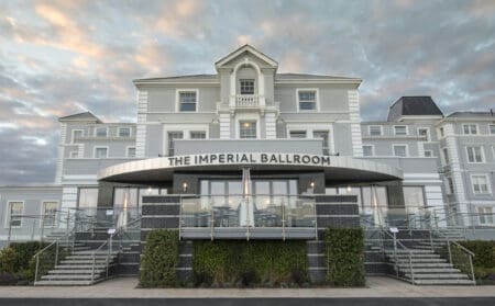 An image of a front view of the Hythe Imperial building during the day